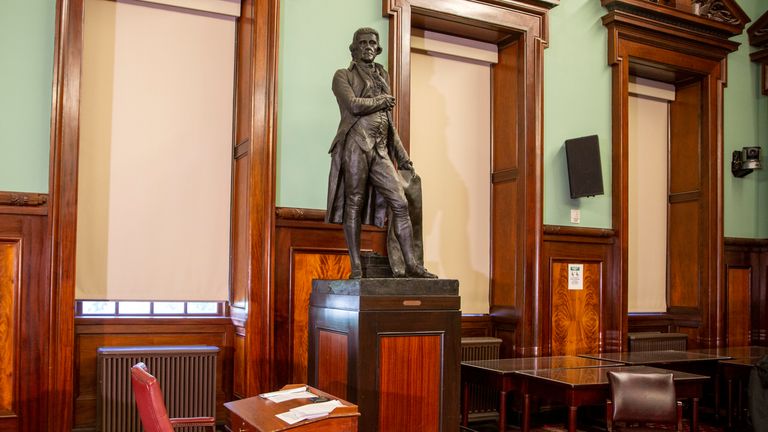 A statue of Thomas Jefferson holding the Declaration of Independence stands in New York&#39;s City Hall Council Chamber on Wednesday, October 20, 2021. The 1833 statue of Jefferson will be removed from the council chamber by the end of the year. Some New York City Council members have called for years to remove the statue from the room where they conduct business because Jefferson was a slaveholder. (AP Photo/Ted Shaffrey)