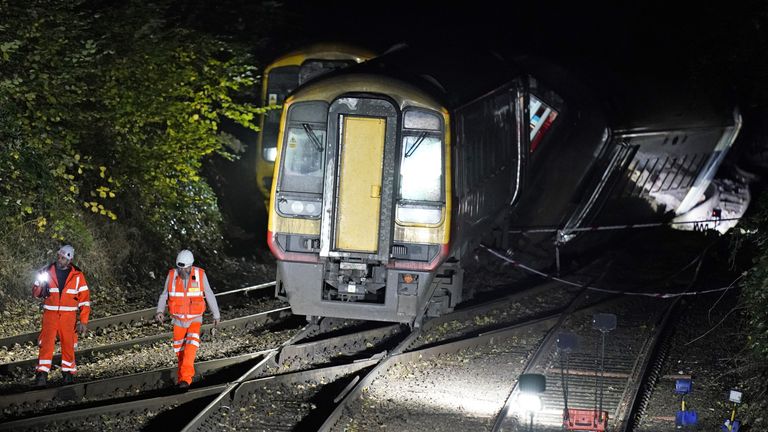 Emergency services at the scene of a crash involving two trains near the Fisherton Tunnel between Andover and Salisbury in Wiltshire. Fifty firefighters are at the scene of the collision in which up to a dozen passengers are believed to have been injured. Picture date: Monday November 1, 2021.
