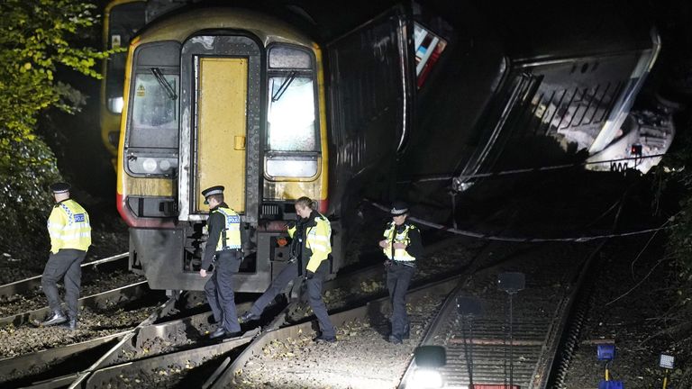 Emergency services at the scene of a crash involving two trains near the Fisherton Tunnel between Andover and Salisbury in Wiltshire. Fifty firefighters are at the scene of the collision in which up to a dozen passengers are believed to have been injured. Picture date: Monday November 1, 2021.
