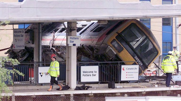 The scene of the rail crash, Potters Bar, Hertfordshire. A West Anglia Great Northern spokeswoman said it was thought that about 20 to 30 people were in the carriage that hit the bridge - 6 passengers are reported dead and several people injured.