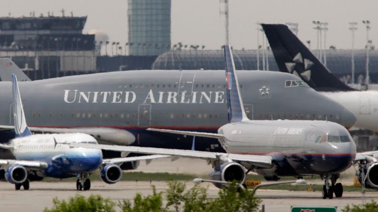 United Airlines planes taxi at Chicago&#39;s O&#39;Hare International Airport, May 17, 2005