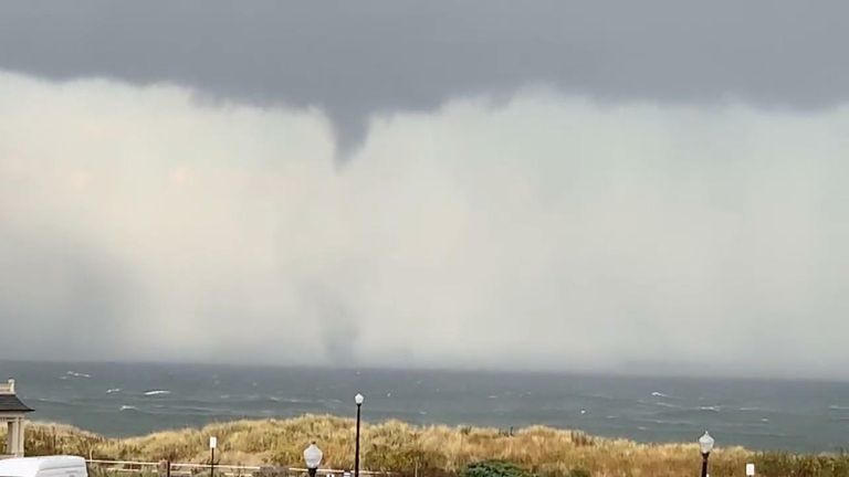 A waterspout spins off the New Jersey coast amid tornado warnings 
