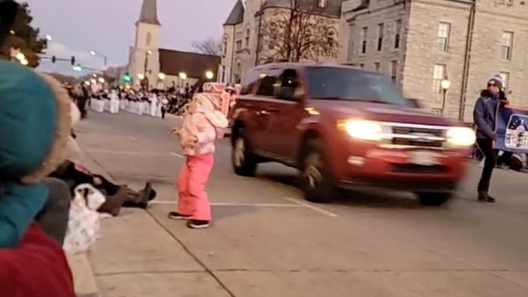 An SUV speeds into a crowd of people during a Christmas parade in Waukesha, Wisconsin. Pic: Jesus Ochoa