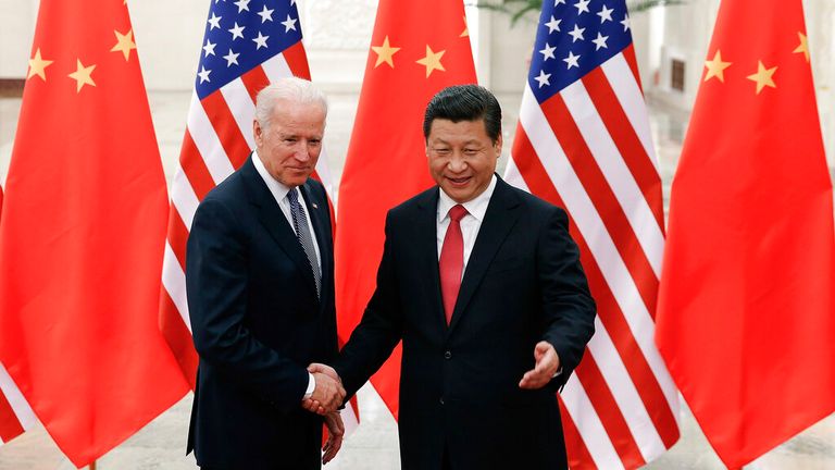 BEIJING, CHINA - DECEMBER 04:  Chinese President Xi Jinping (R) shake hands with   U.S Vice President Joe Biden (L) inside the Great Hall of the People on December 4, 2013 in Beijing, China. U.S Vice President Joe Biden will pay an official visit to China from December 4 to 5.  (Photo by Lintao Zhang/Getty Images)