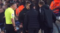 Arsenal manager Mikel Arteta (centre) speaks with referee Andre Marriner (left) and fourth official John Brooks after alleged racist abuse was aimed at the Arsenal bench during the Premier League match at Elland Road, Leeds. Picture date: Saturday December 18, 2021.