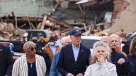 U.S. President Joe Biden surveys storm damage from the tornadoes and extreme weather as he tours a neighborhood with Kentucky's first lady Britainy Beshear, Mayfield's Mayor Kathy O'Nan and Anne Henning Byfield, Presiding Bishop of the AME Council of Bishops, in Mayfield, Kentucky, U.S., December 15, 2021. REUTERS/Evelyn Hockstein