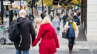 A shopper wearing a face mask on Oxford Street, in central London