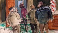 This courtroom sketch shows Ghislaine Maxwell, center, being led out of the courtroom into the lock up by four U.S. Marshals after a jury returned a guilty verdict in her sex trafficking trial, Wednesday Dec. 29, 2021, in New York. (Elizabeth Williams via AP)