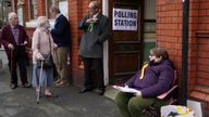 People arrive to cast their votes at the polling station in the Memorial Hall in Oswestry, during voting for the North Shropshire by-election which was triggered by Owen Paterson&#39;s resignation. Picture date: Thursday December 16, 2021.
