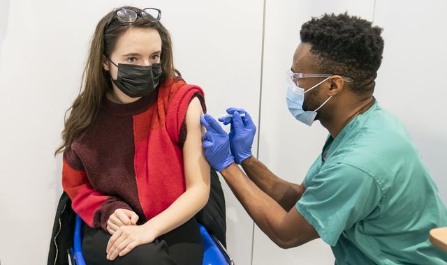 COVID-19 boosters available on Christmas Day in NHS 'jingle jab' campaign amid surging infection rates - Vimarsana News