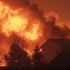 Tens of thousands scramble to escape wildfires tearing through Colorado
