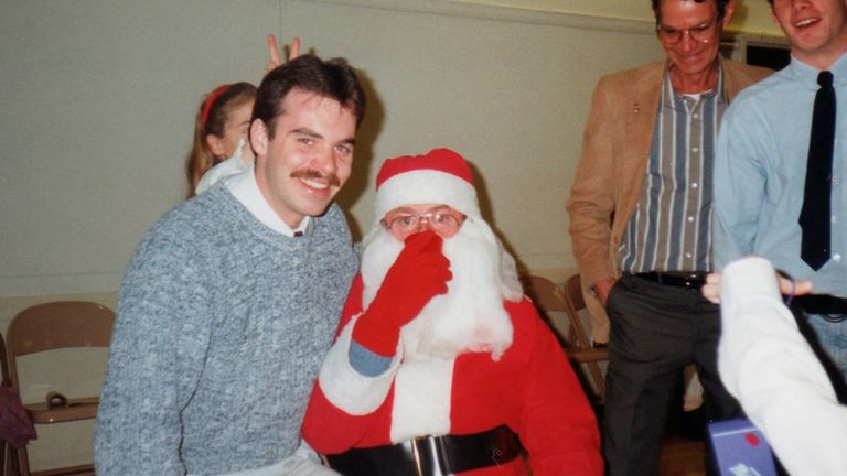 Eric Wasson, left, sits on Santa&#39;s lap after receiving a a box of "Santa&#39;s Book of Candy," a re-gift from his brother Ryan, during Christmas time 1992
PIC:AP