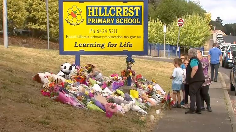 Flowers and tributes are seen outside Hillcrest Primary School in Devonport, in the island state of Tasmania, Australia Friday, Dec. 17, 2021. Christmas lights have been turned off and a candlelight vigil was held in the Australian town where some children died after falling from a bouncy castle that was lifted into the air by a gust of wind. (Ethan James/AAP Image via AP)
Pic :AAP Image /AP

