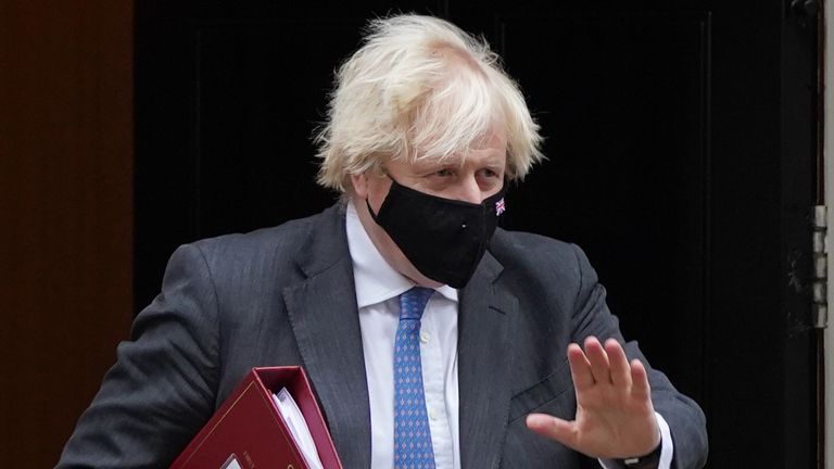 Prime Minister Boris Johnson leaves 10 Downing Street, London, to attend Prime Minister's Questions at the Houses of Parliament. Picture date: Wednesday December 15, 2021.
