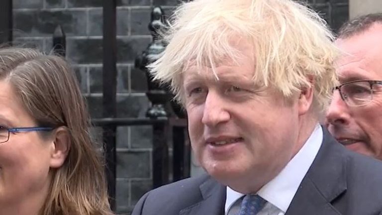 Boris Johnson does not respond to questions on COVID during a photo call in Downing Street