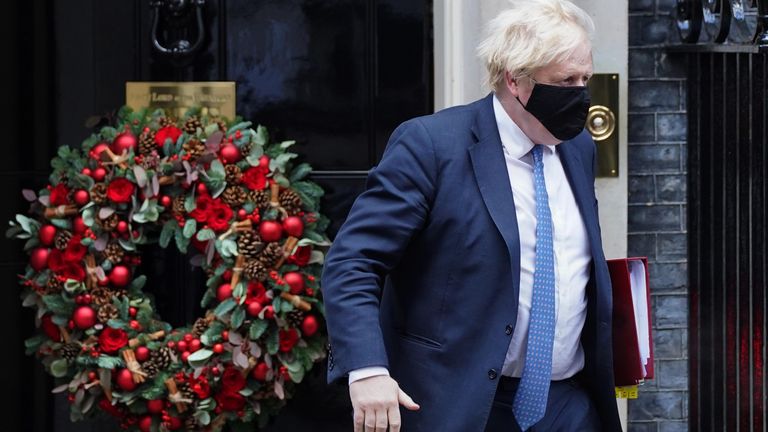 Prime Minister Boris Johnson leaves 10 Downing Street, London, to attend Prime Minister&#39;s Questions at the Houses of Parliament. Picture date: Wednesday December 1, 2021.

