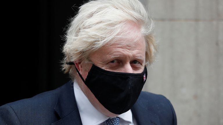 Britain&#39;s Prime Minister Boris Johnson walks outside Downing Street in London, Britain, December 8, 2021. REUTERS/Peter Nicholls
