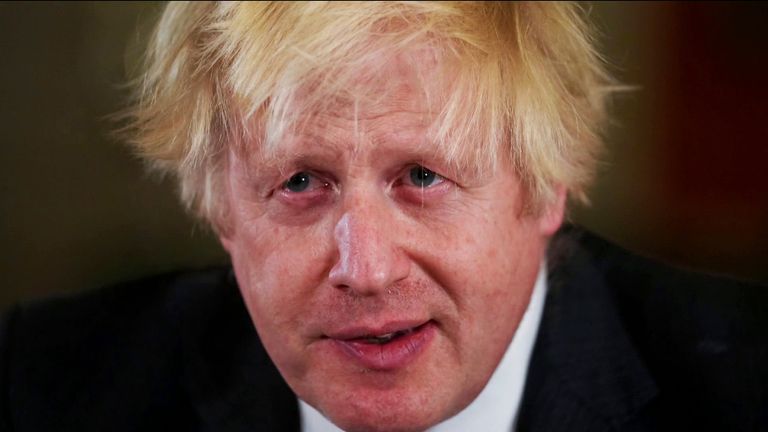 Boris Johnson's government wins COVID-19 vote by a narrow margin