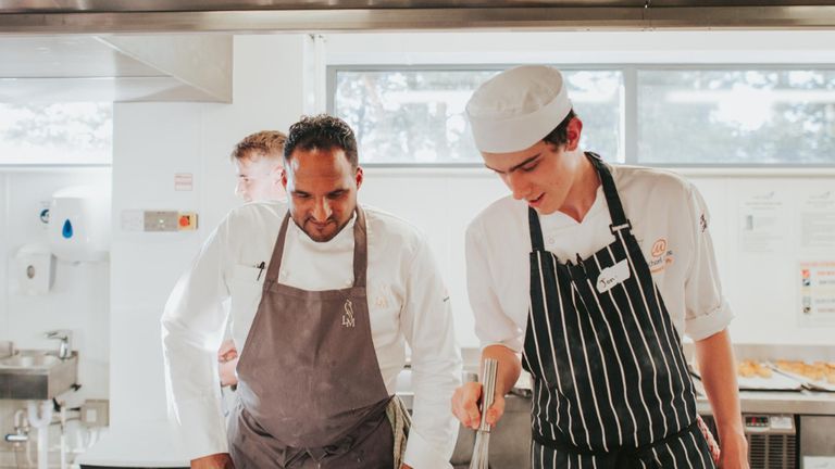 Michael Caines (L) with one of his young chefs