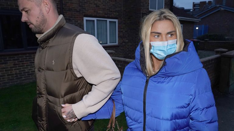 Katie Price, with Carl Woods (left) and an unidentified man, leaving Crawley Magistrates & # 39;  Court in West Sussex after she was given a 16-week suspended prison sentence for unqualified and uninsured drink driving following a crash near her home in Sussex.  The former glamor model, 43, was also banned from driving for two years for a crash in a B2135 near Partridge Green on September 28. Picture date: Wednesday, December 15, 2021.