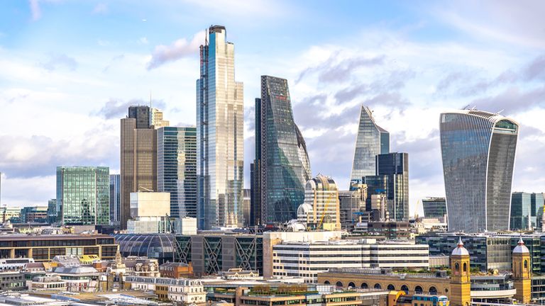 The 'cheesegrater' building (middle) was also designed by Rogers and is home to his firm 