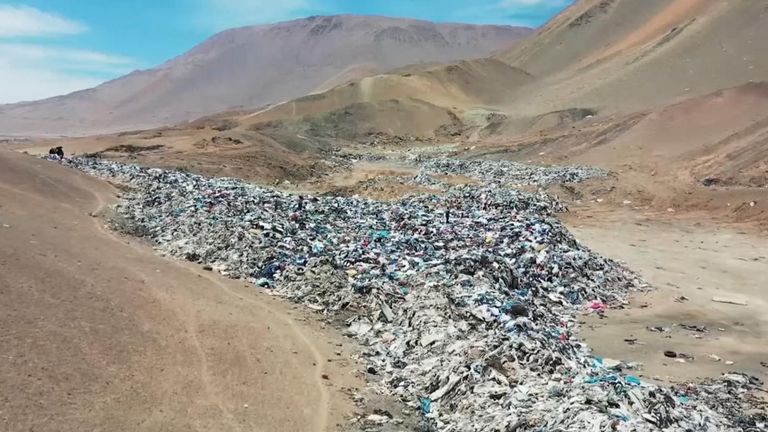 Knock-off clothes dumped in pile in Chile desert