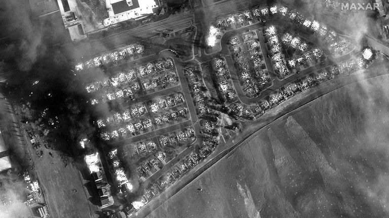 In a photo provided by Maxar Technologies, homes in a development burn from wildfires Thursday, Dec. 30, 2021, in Superior, Colo. (Maxar Technologies via AP)