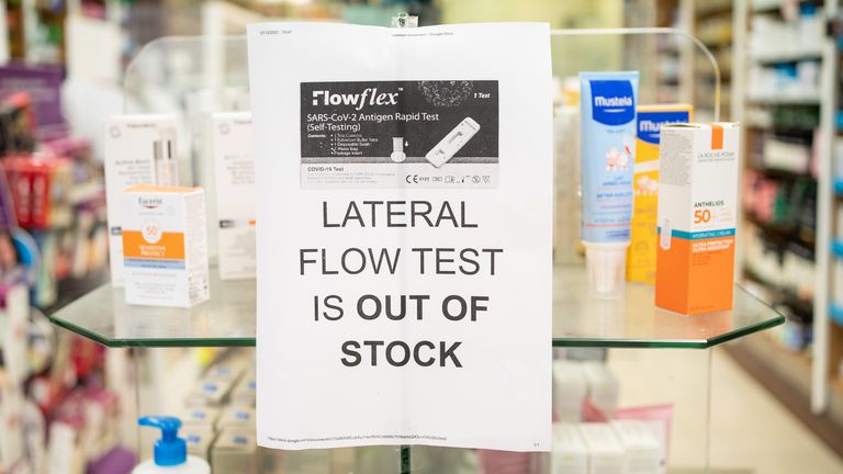 A sign saying lateral flow COVID tests are out of stock at a pharmacy in London