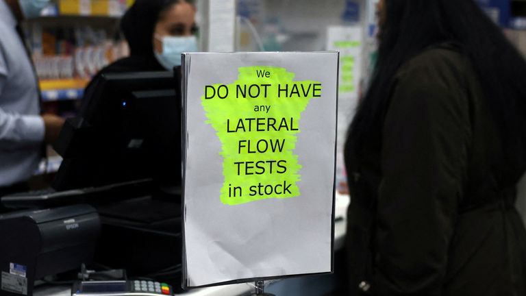 A sign informing customers that lateral flow tests are out of stock at a pharmacy in London