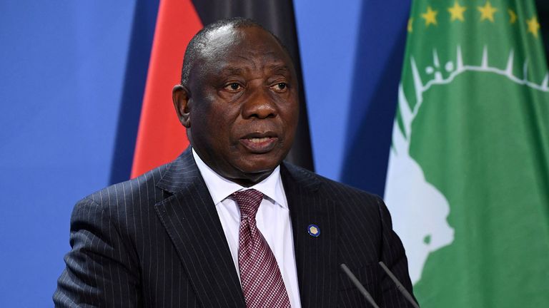 FILE PHOTO: South African President Cyril Ramaphosa addresses a press conference after the G20 Compact with Africa conference at the Chancellery in Berlin, Germany August 27, 2021. Tobias Schwarz/Pool via REUTERS//File Photo
