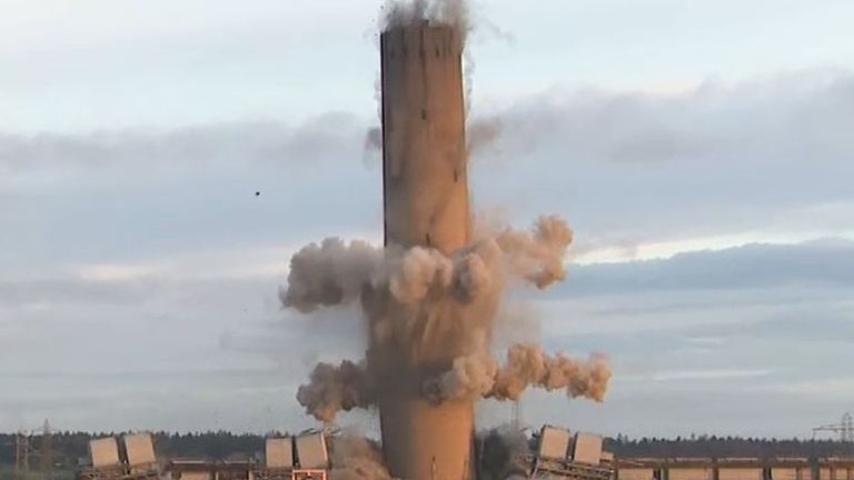 Coal-fired power station chimney is demolished in Scotland