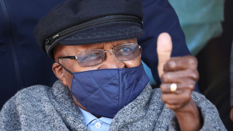 Archbishop Desmond Tutu gestures after receiving his coronavirus (COVID-19) vaccination in Cape Town, South Africa, May 17, 2021. REUTERS/Mike Hutchings
