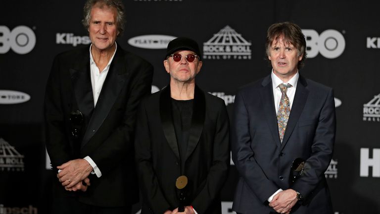 Dire Straits members (from left) John Illsley, Alan Clark and Guy Fletcher at their induction into the Rock and Roll Hall of Fame in 2018. Pic: AP