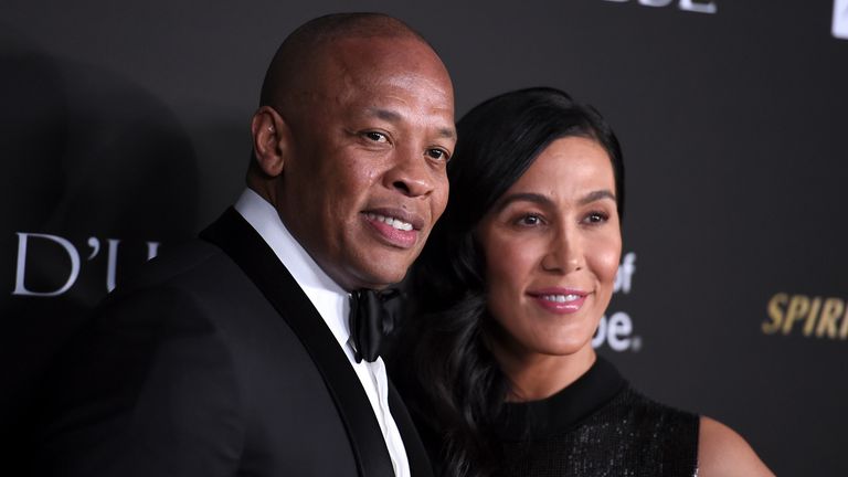 Dr Dre, left, pictured with Nicole Young in 2018. Pic: AP