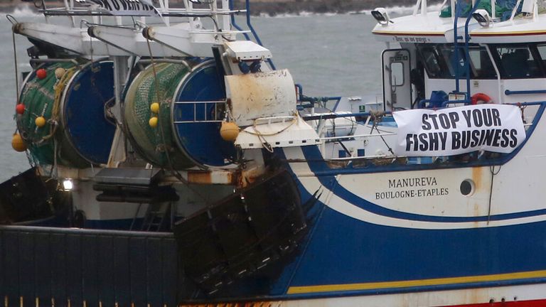 A French fishing boat blocking the entrance to the port of Calais in a bid to disrupt goods supply to the UK, in response to the row Pic: AP 