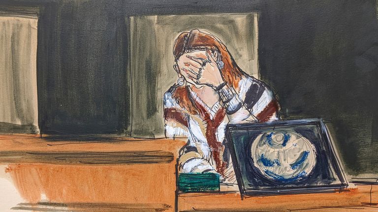 Court sketch shows Carolyn breaking down while appearing on the witness stand. 