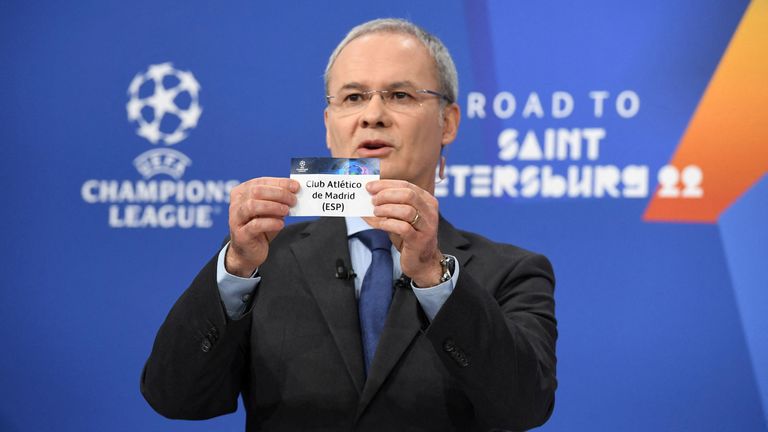 UEFA Deputy General Secretary Giorgio Marchetti draws out the card of Atletico Madrid during the UEFA Champions League 2021/22 Round of 16 draw