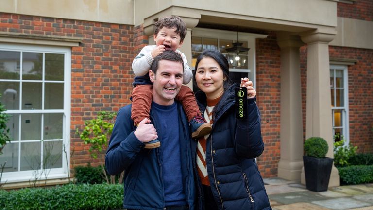 Heekyoung Jin, her partner Tom Hall and their son Luka