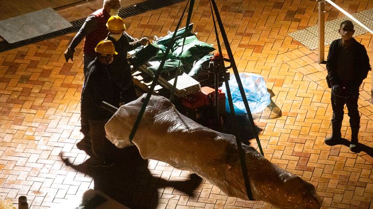 A memorial for those killed in the 1989 Tiananmen crackdown, is removed from the University of Hong Kong