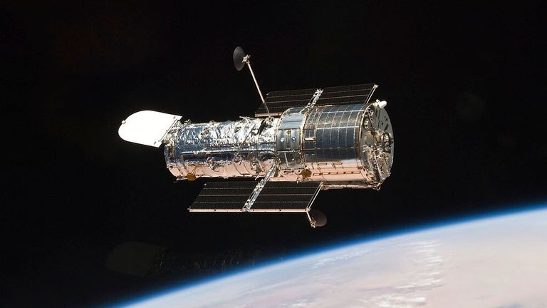 The Hubble telescope orbiting the Earth. Pic: NASA via AP