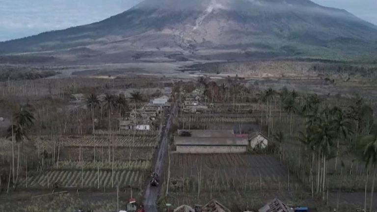 Village near Indonesia&#39;s Semeru volcano is covered with ash