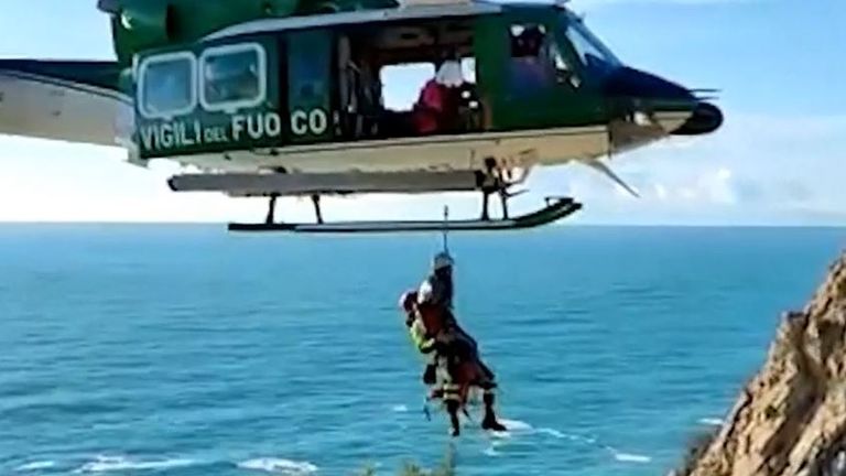 Woman rescued from cliff edge in Genoa