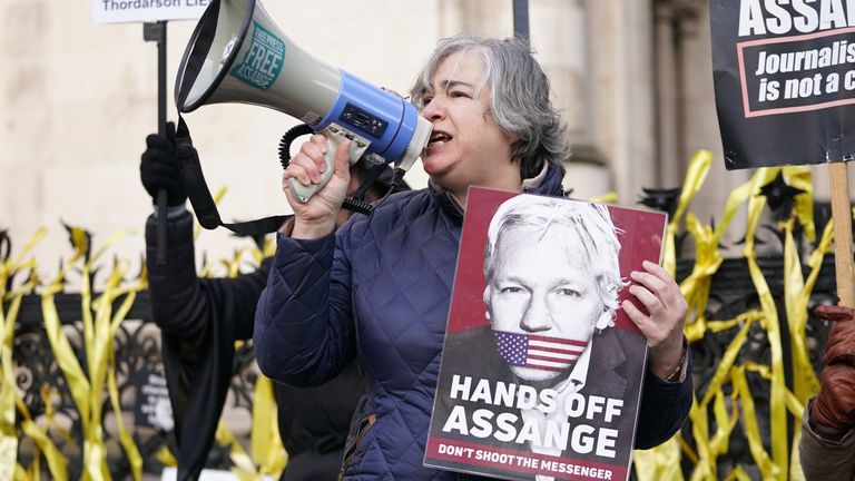 Supporters of Julian Assange demonstrate outside the Royal Courts of Justice in London, where the US Government has won its bid to overturn a judge&#39;s decision not to extradite WikiLeaks founder. Picture date: Friday December 10, 2021.

