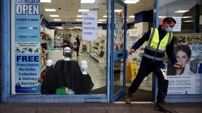 A sign informing customers that lateral flow tests are out of stock is seen at a pharmacy amid the coronavirus disease (COVID-19) outbreak, in London, Britain December 15, 2021. REUTERS/Kevin Coombs
