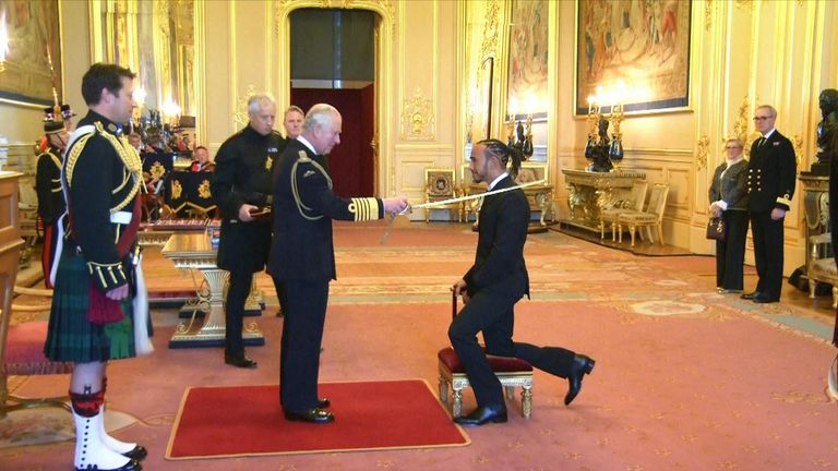 Formula One racing driver Sir Lewis Hamilton was knighted by Prince Charles at Buckingham Palace for his services to motorsport.