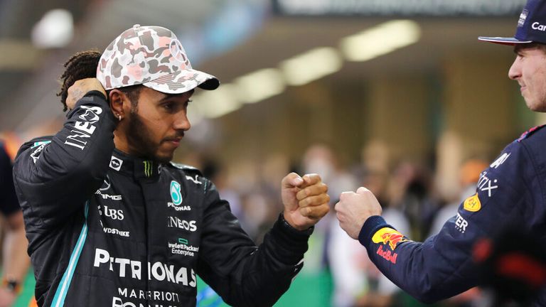 Hamilton appears dejected as he bumps fists with Verstappen following the qualifier Pic: AP 