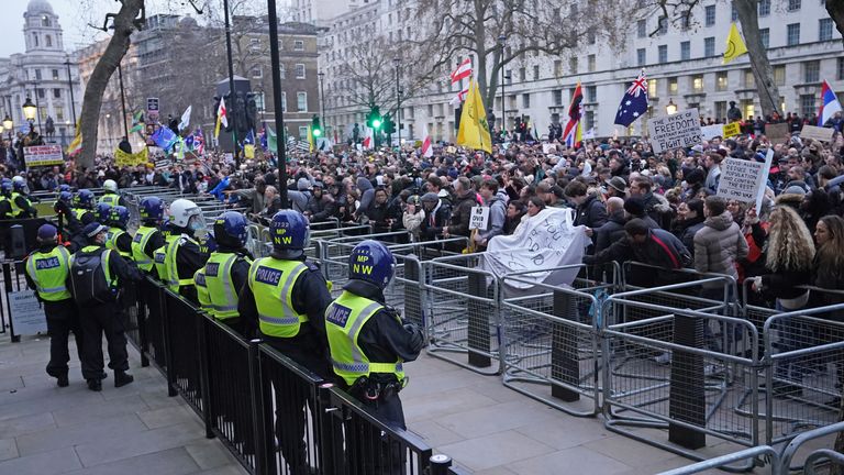 Protestors gathered on Whitehall near Downing Street to demonstrate against the latest COVID restrictions. 