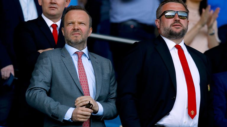 Manchester United Chief Executive Ed Woodward (left) and Manchester United director Richard Arnold in the stands during the Premier League match at Goodison Park, Liverpool.
