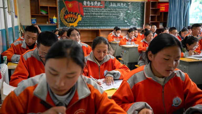 Students attend a Chinese language learning class at Nagqu No. 2 Senior High School, a public boarding school for students from northern Tibet. Pic: AP