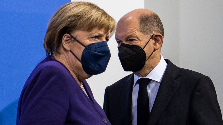 Olaf Scholz was finance minister in Angela Merkel&#39;s cabinet during her fourth term of office. Pic: AP